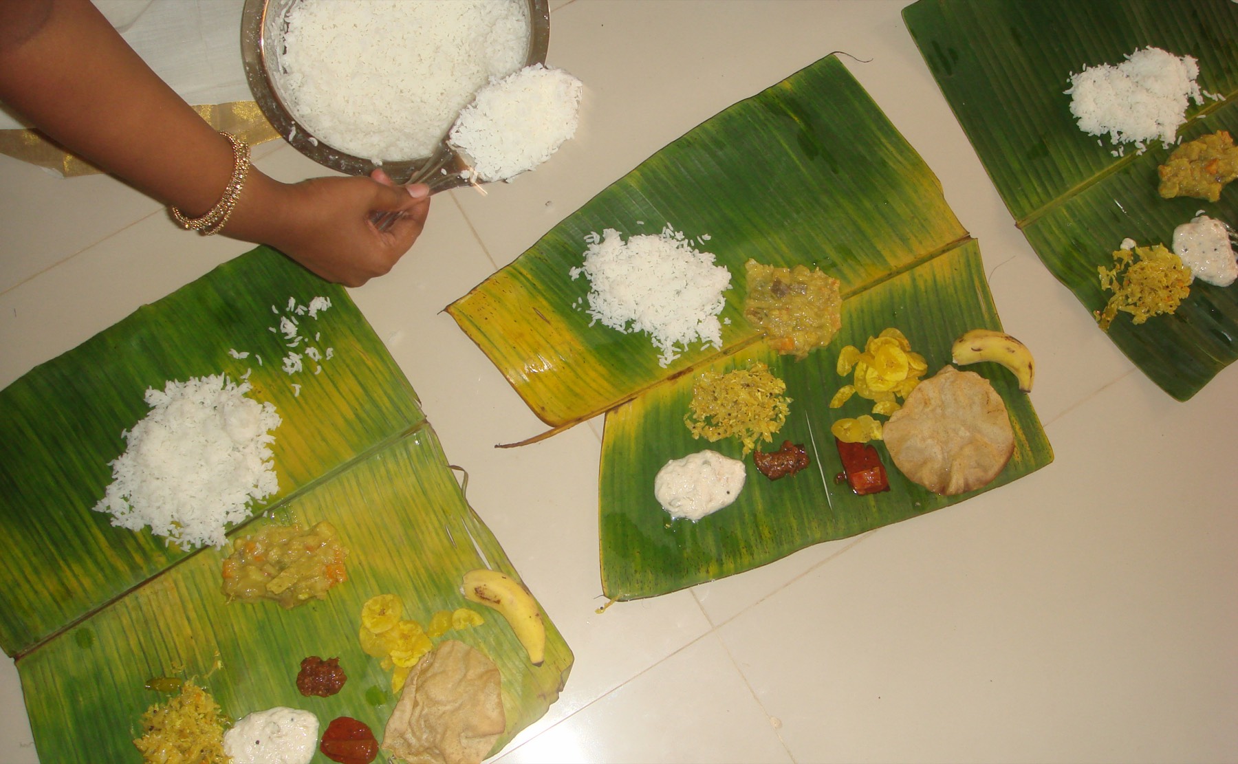 Kerala sadya served on a banana leaf