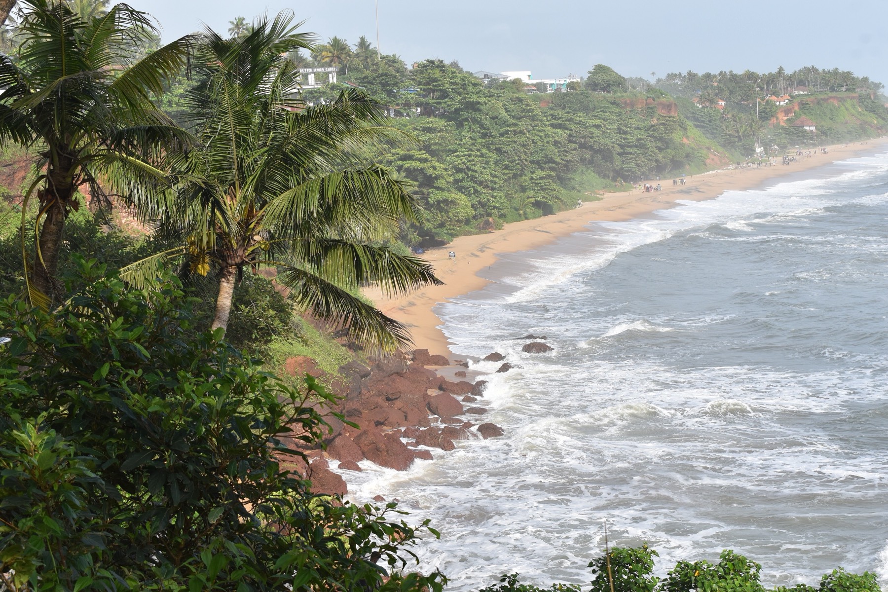 Red laterite cliff and beach at Varkala
